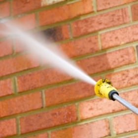 Pressure Washing a Brick Wall